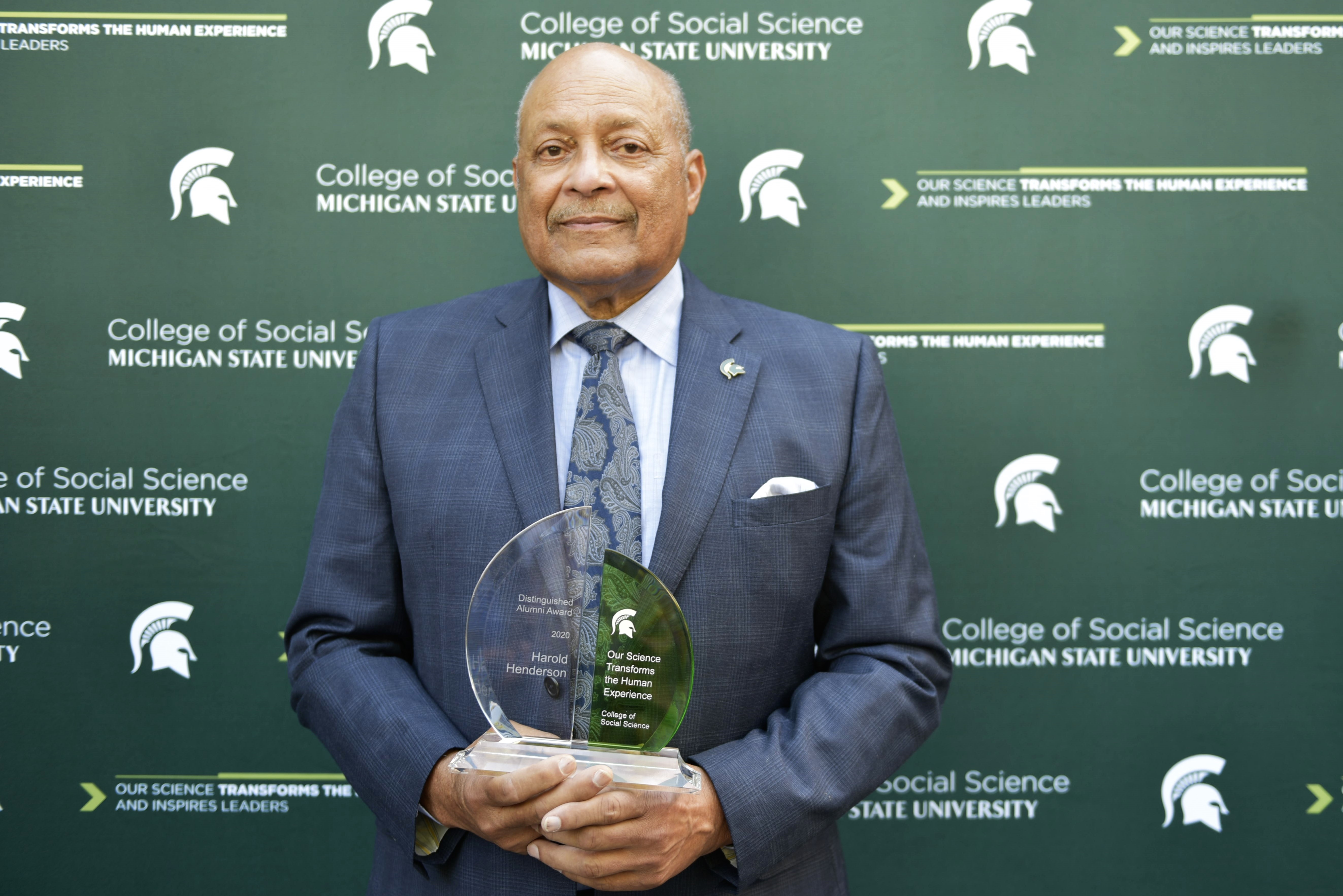 Harold Henderson in Fall 2021 Receiving the College of Social Science Distinguished Alumni Award. 
